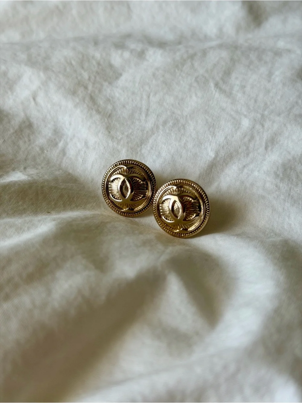 CHANEL Gold Round Interlocking CC Button Earrings